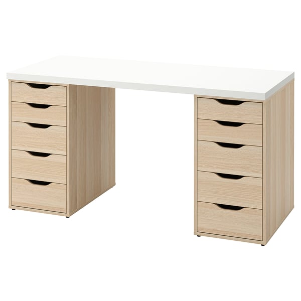 Escritorio ikea LAGKAPTEN en branco con caixóns de madeira. O seu compacto, rectangular e catro caixóns a cada lado para almacenamento.