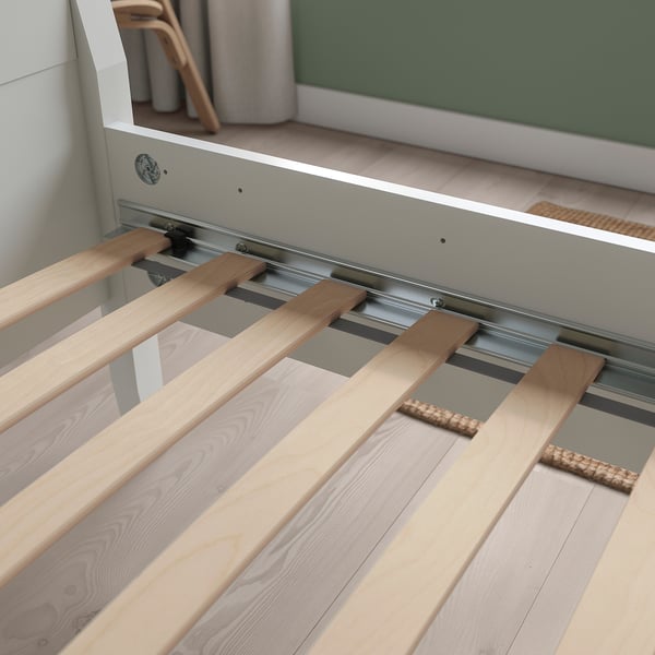 Base de cama de madeira con soportes curvos, deseñada para a absorción de peso corporal e a circulación do aire.