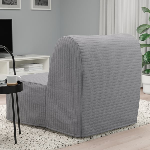 Combinación moderna de cadeira-cama en gris. Transfórmase facilmente nunha cama e ofrece asentos cómodos con opcións de colchón e cuberta opcionais.