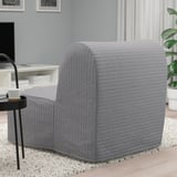 Combinación moderna de cadeira-cama en gris. Transfórmase facilmente nunha cama e ofrece asentos cómodos con opcións de colchón e cuberta opcionais.