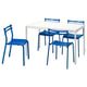 Un comedor azul e branco con mesa cadrada e catro cadeiras correspondentes.
