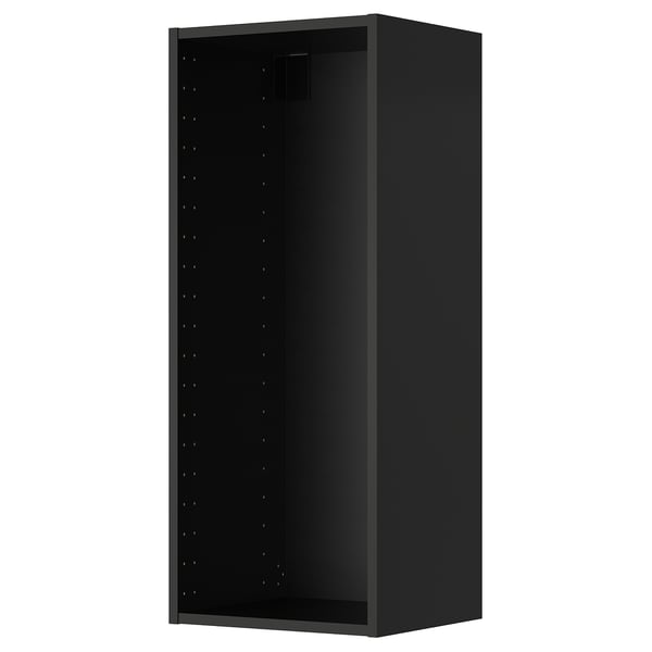 Un armario de parede METOD negro, rectangular e moderno cun deseño plano e buratos perforados para estantes axustables.