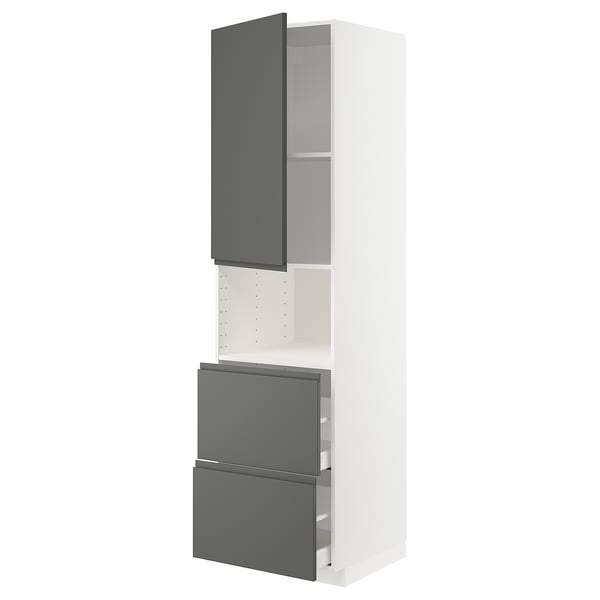 Un armario de cociña METOD en branco, con portas de voxtorp gris escuro con mangos integrados. O armario ten un deseño elegante e moderno.