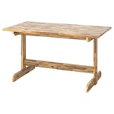 Mesa de comedor rústica Nlackanäs, rectangular, feita de madeira de acacia marrón claro. Deseño inspirado en shaker con patas de mesa centradas.