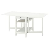 Mesa de comedor branca NÄSINGE transformable con almacenamento.