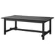 Opción: Mesa de comedor extensible NORDVIKEN negra con madeira, pernas robustas e extensións incorporadas para interiores modernos.