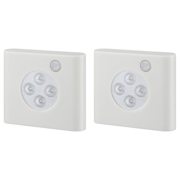 Dúas luces brancas con sensor de movemento OLEBY con emisores de luz circulares e un sensor redondo na parte superior, feitos de plástico abs.