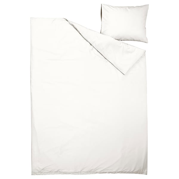 Conxunto de roupa de cama branco PILTANDVINGE. Inclúe cuberta de duvet e funda de almofada. Feito de poliéster e viscosa reciclados. Branco sólido, deseño limpo.
