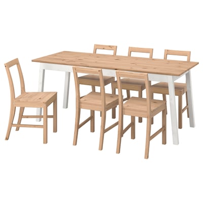 Conxunto de comedor PINNTORP con pernas brancas, cadeiras de madeira clara, rectangular.