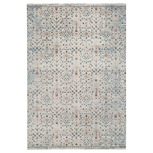 A alfombra ROMDRUP é unha alfombra gris clara con intrincados deseños florais azuis e laranxas, feita de polipropileno.