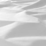 Saba de cama nítida e suave con sombras intrincadas, que indica textura e tecido de alta calidade.