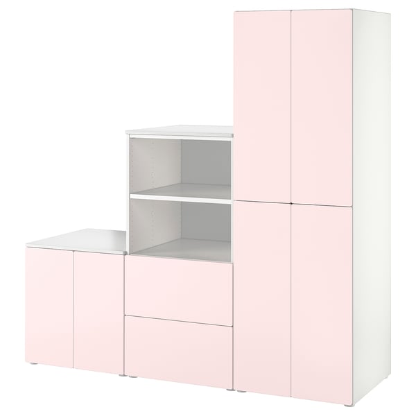 Mostra un armario SMÅSTAD rosa claro, rectangular e modular, ideal para habitacións infantís, con múltiples compartimentos para almacenar roupa.