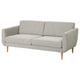 Un sofá gris SMEDSTORP con estilo retro e confort moderno, mostrando formas suaves, coxíns de escuma, brazos e pernas en forma de cono.