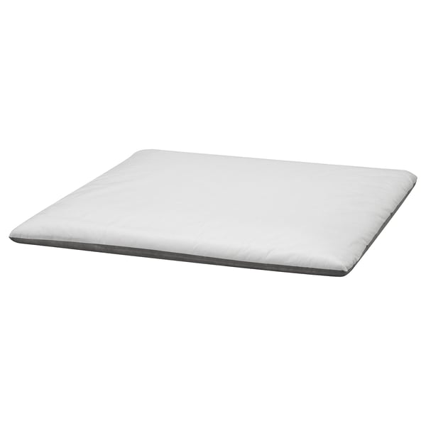 Almofada de colchón branco SÖDERHAMN, rectangular, deseño sinxelo cunha superficie texturizada.