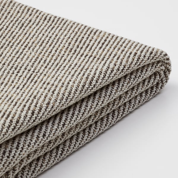 Manta de raias texturizadas dobradas, beige e gris, patrón de malla lisa.