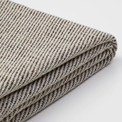 Manta de raias texturizadas dobradas, beige e gris, patrón de malla lisa.