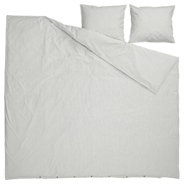 Conxunto de cubertas de duvet Ikeas SOLFIBBLA, raias brancas e negras, algodón, rectangular, con 2 fundas de almofadas.