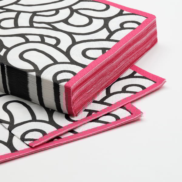 Pila de servilletas elegantes e altamente absorbentes con bordos rosados con patróns en branco e negro.