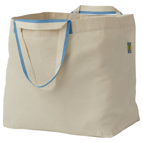 Bolsa de algodón crema con revestimento azul, mangos grandes, logotipo pequeno. Duradeiro e lavable.