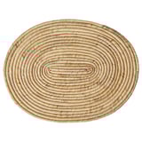 Alfombra oval STAMSILL: hiacinto de auga natural tecido a man, tons terrosos, deseño circular intrincado.