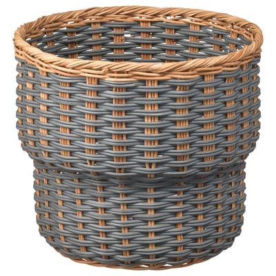 Cesta de planta de rattan, gris e beige, forma cilíndrica, deseño tecido.