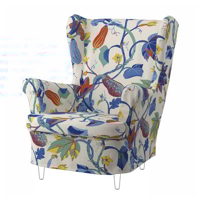 Cadeira de brazos branca floral, respaldo alto, estampado de follas coloridas, pernas de madeira.