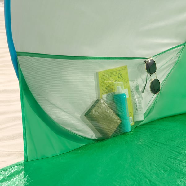 Tenda de praia con petos laterais e malla para o fluxo de aire.