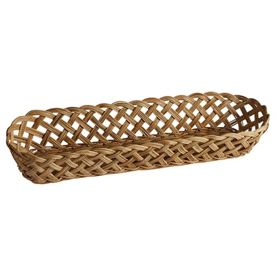 Unha cesta de pan STYLTSNÄPPA marrón, tecida a man en ratán, cun deseño en celosía e forma estreita.