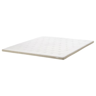 Almofada de colchón TISTEDAL en branco. É un núcleo de látex natural e tecido transpirable. Os bordos teñen un deseño de liño texturizado.