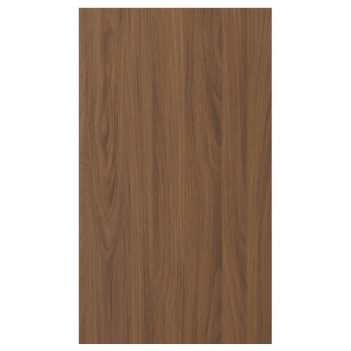 Unha porta frontal TISTORP cun acabado de nogueira, textura suave e deseño clásico. Rectangular, feito de taboleiro de partículas con bordo de plástico.