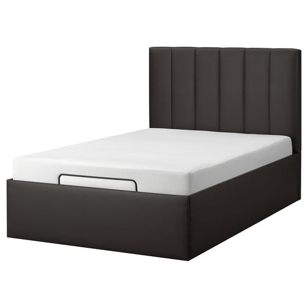 Moderna cama de plataforma negra con cabeceira acolchada, deseño elegante.