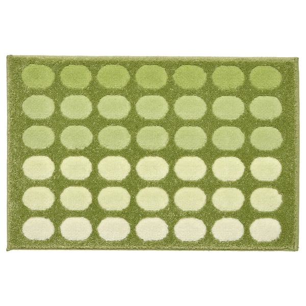 Alfombra rectangular verde con patrán de puntos brancos, feita de polipropileno.