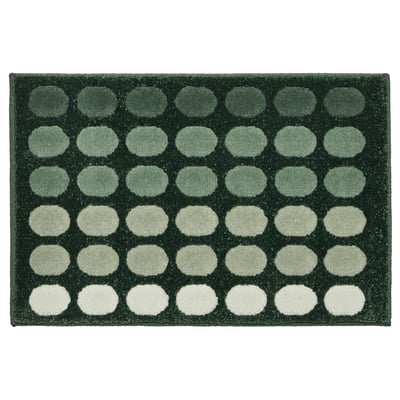 Alfombra TUNNELBANA verde escuro con patranza de gradiente circular, feita en polipropileno, rectangular e texturizada.