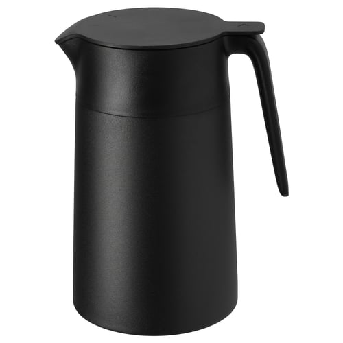 Flasco negro illado UNDERLÄTTA, elegante e cilíndrico cun mango robusto e un foco para un derramamento fácil.