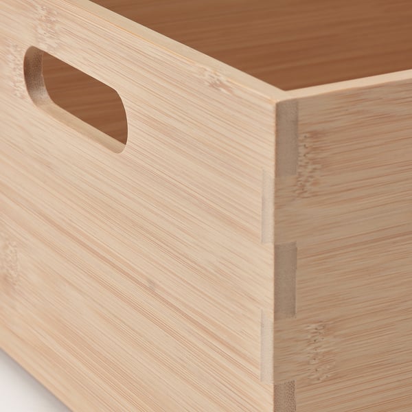 Caixa de madeira natural con mango robusto, ideal para almacenamento e organización.