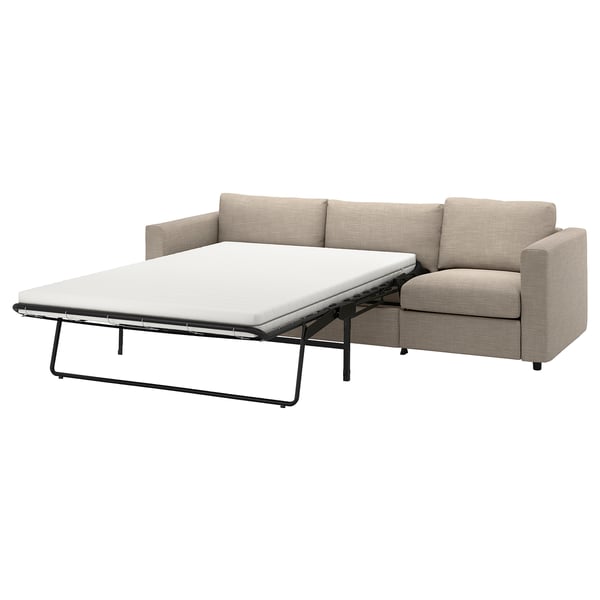 Sofá de cama beige con marco metálico negro. Sofá de cama moderna con marco negro. Sofá-cama de marco negro.