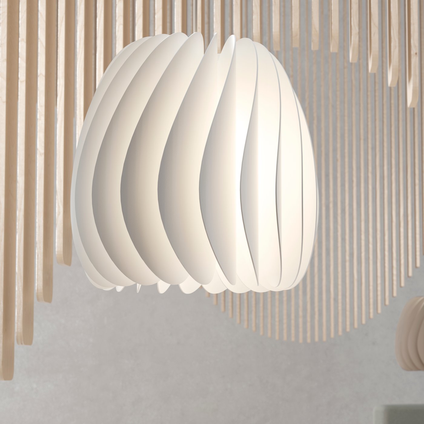 En närbild på SKYMNINGEN taklampa i vitt.