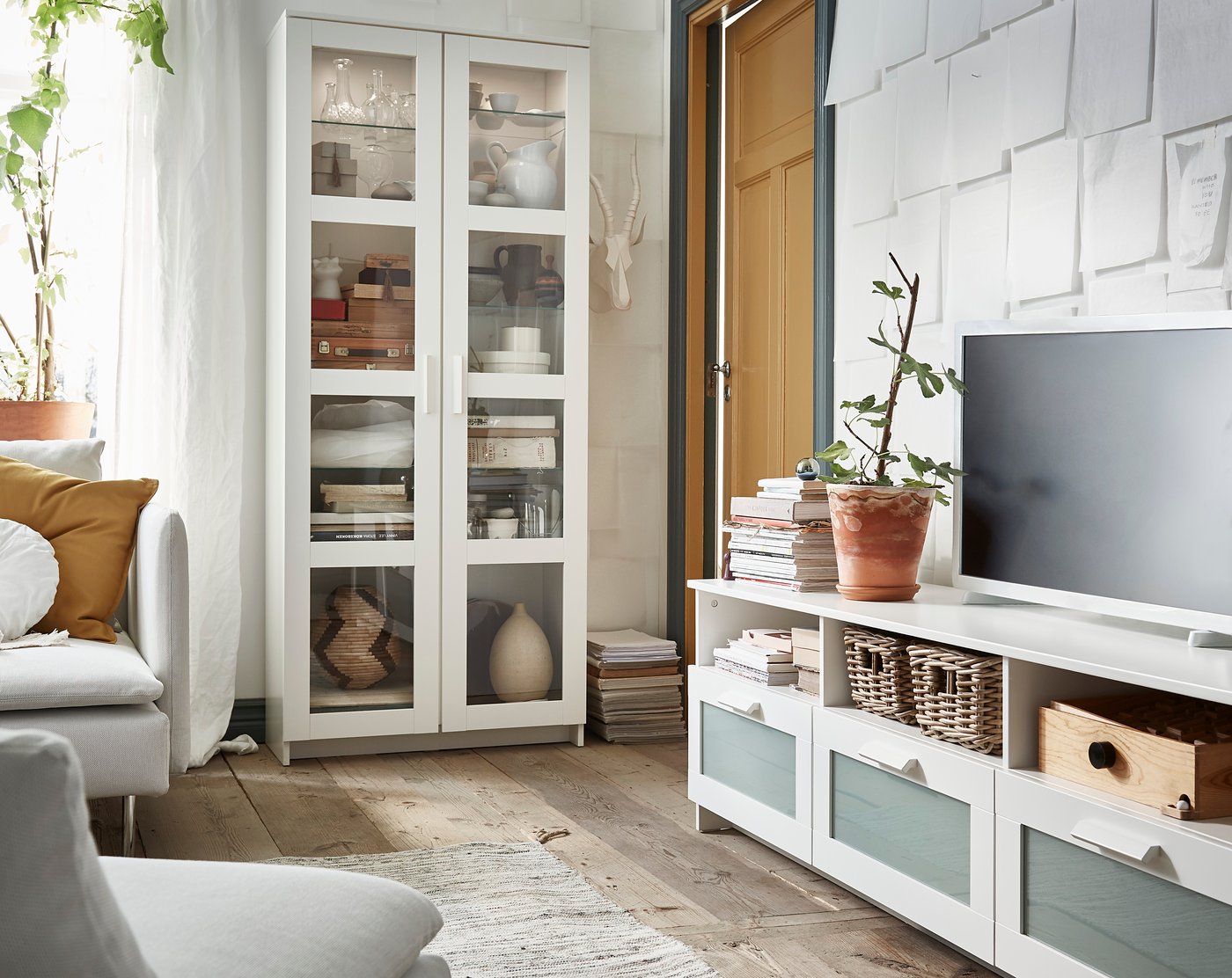 A white BRIMNES TV bench in the living room