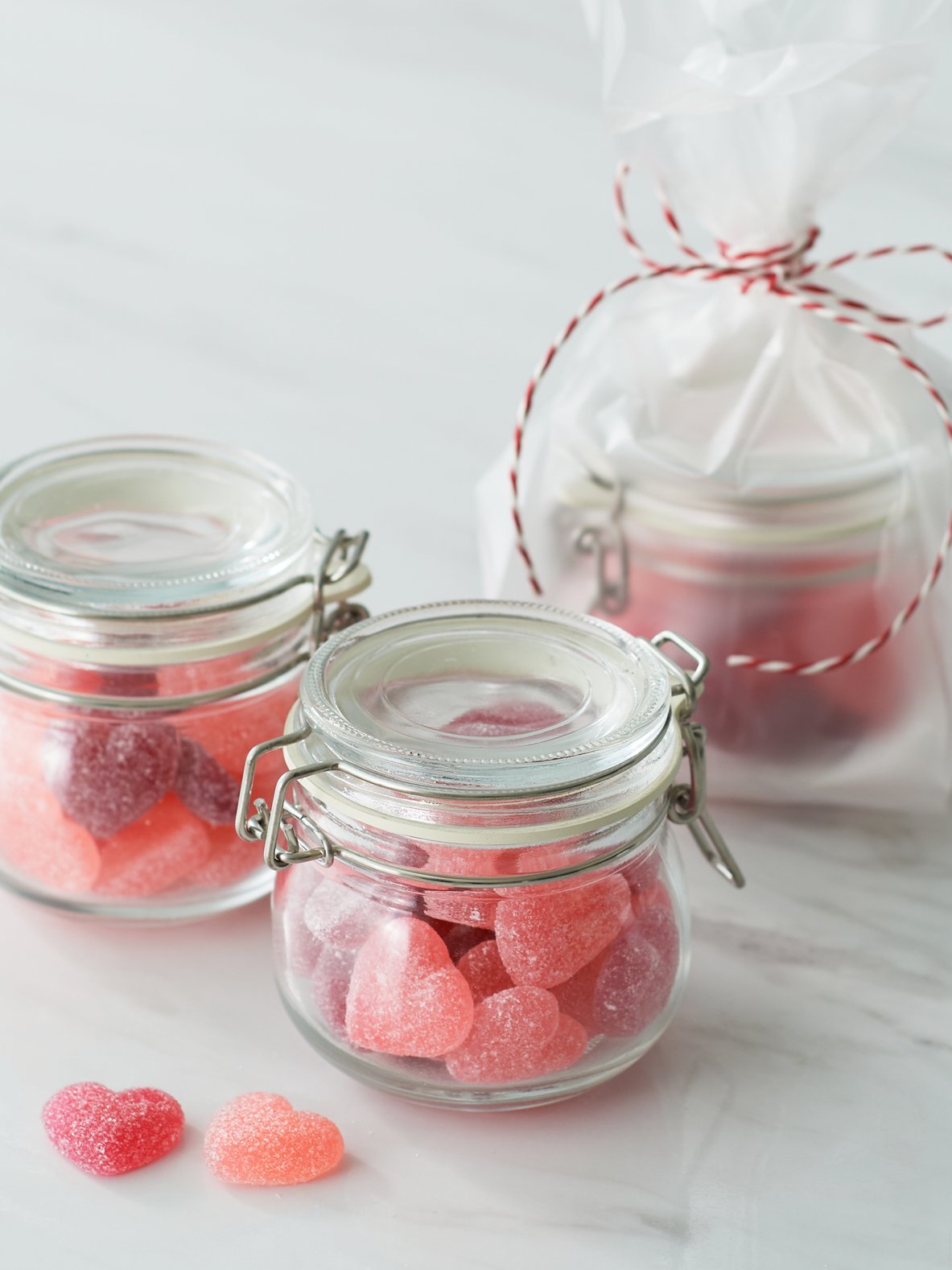 A clear glass KORKEN jar with lid
