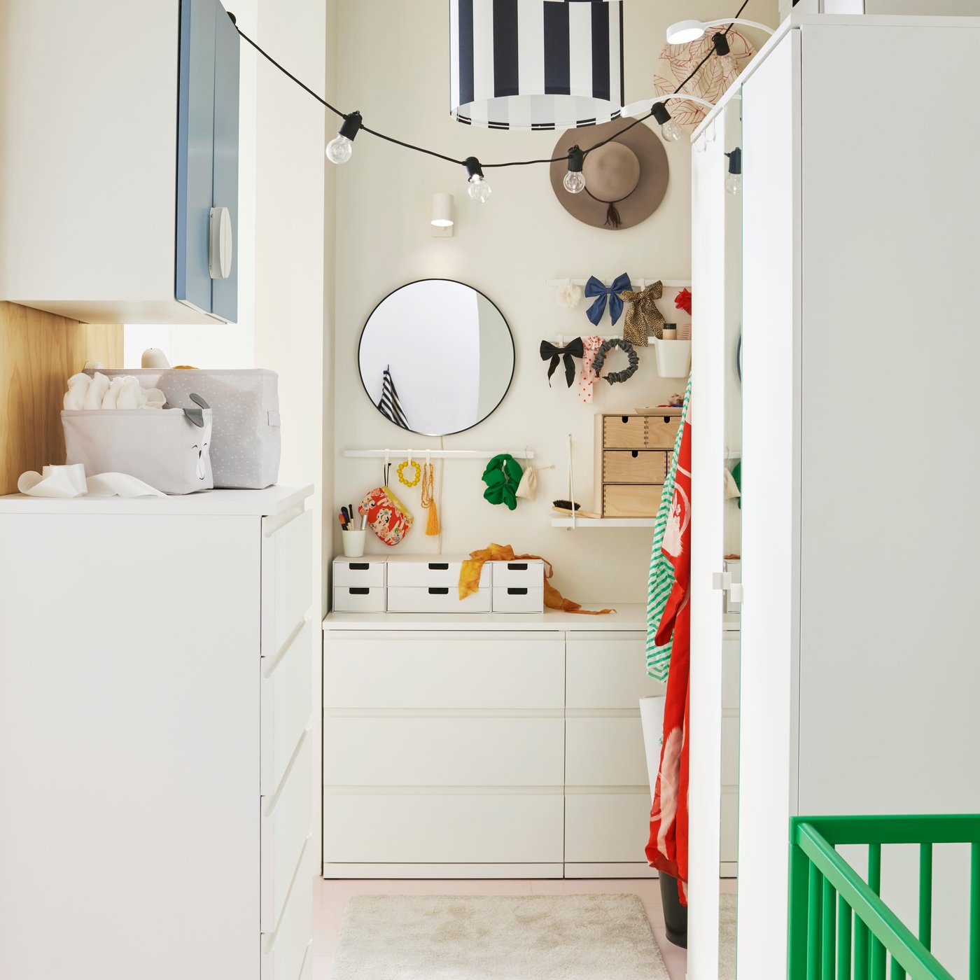 A dressing area with a white VIHALS wardrobe on one side and a white STORKLINTA chest with 6 drawers at one end.