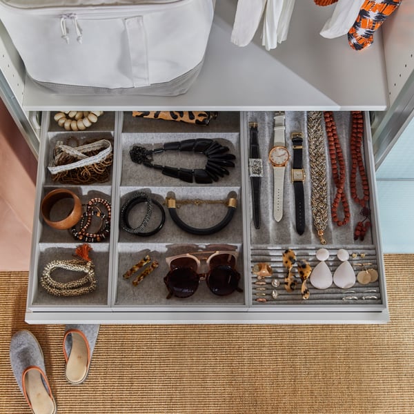 Top view of an organized jewelry drawer