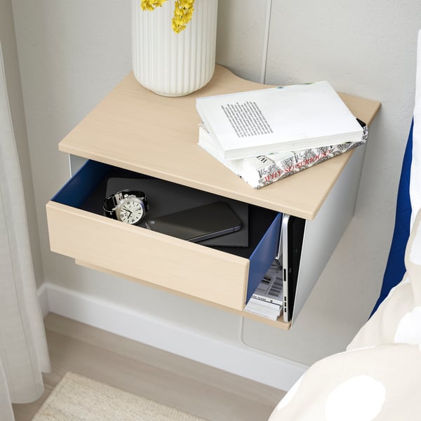A birch effect white/blue STOMSÖ wall-mounted bedside table