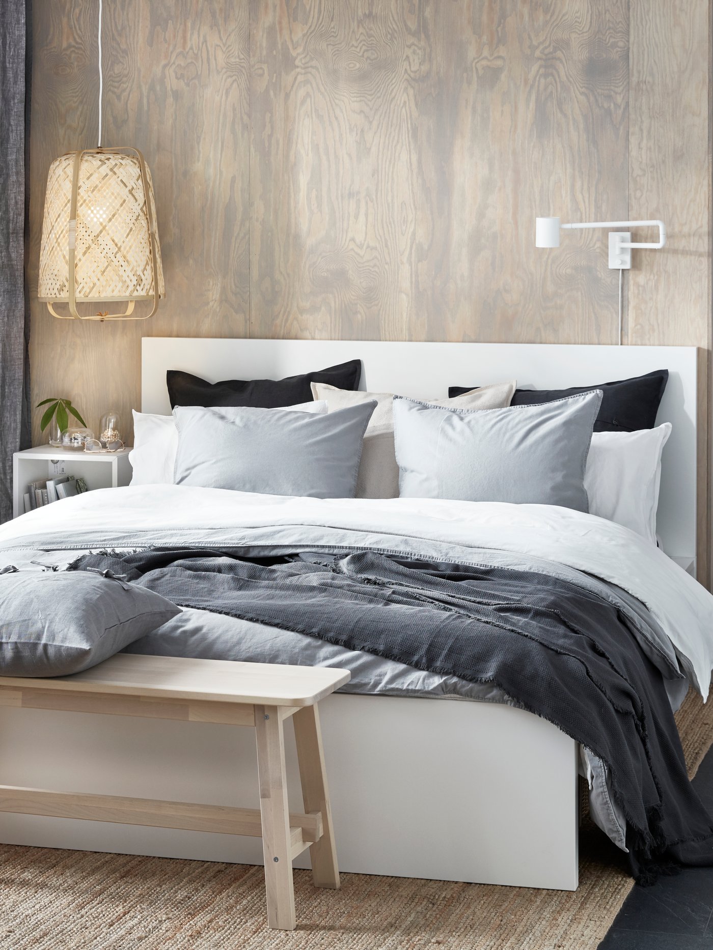 A grey ODDRUN throw in the bedroom