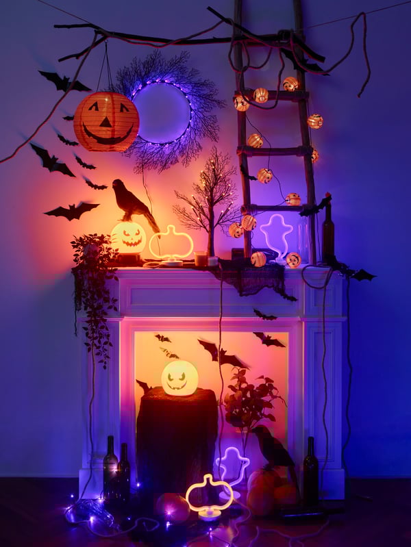 An artificial tree/black KUSTFYR LED table lamp
