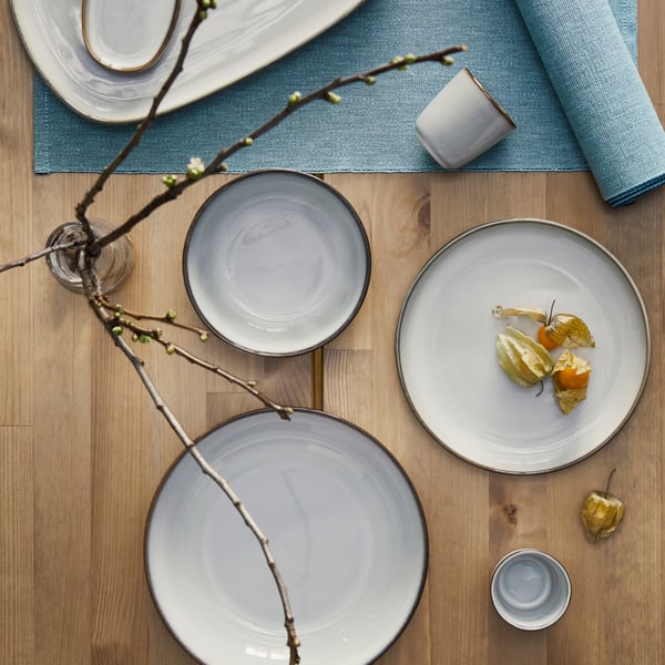 A grey GLADELIG plate