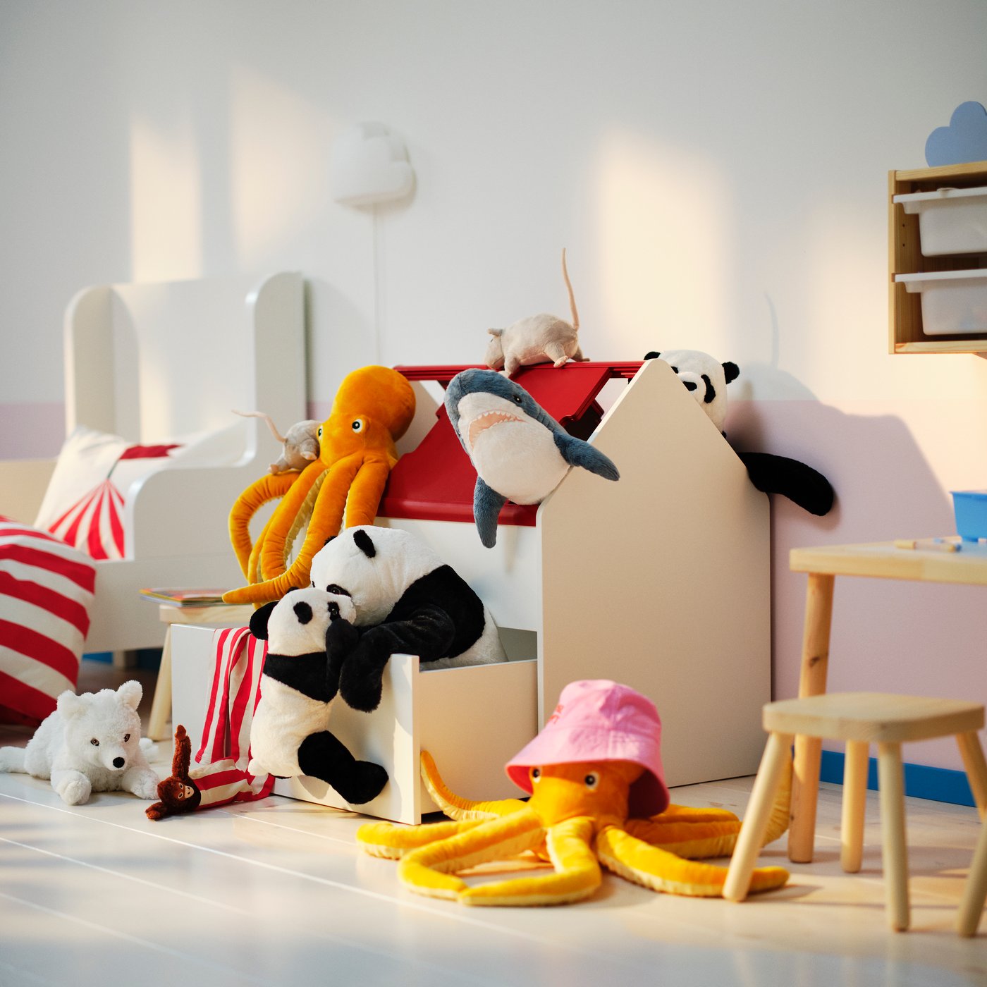 A white/red VITBJÖRN storage unit with drawer