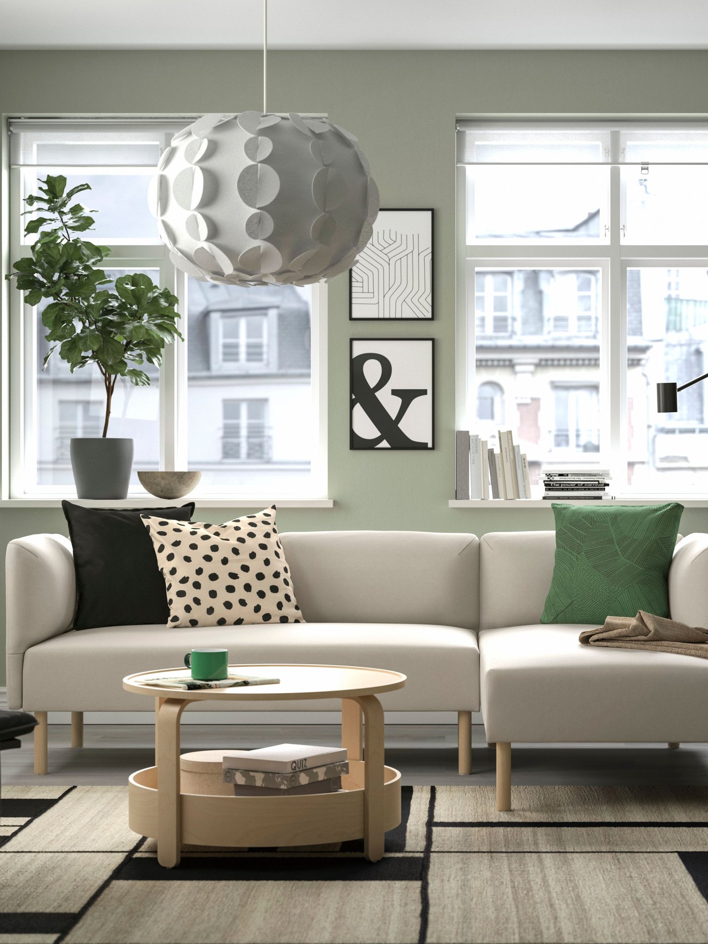 An off-white/dot pattern black ODDNY cushion cover