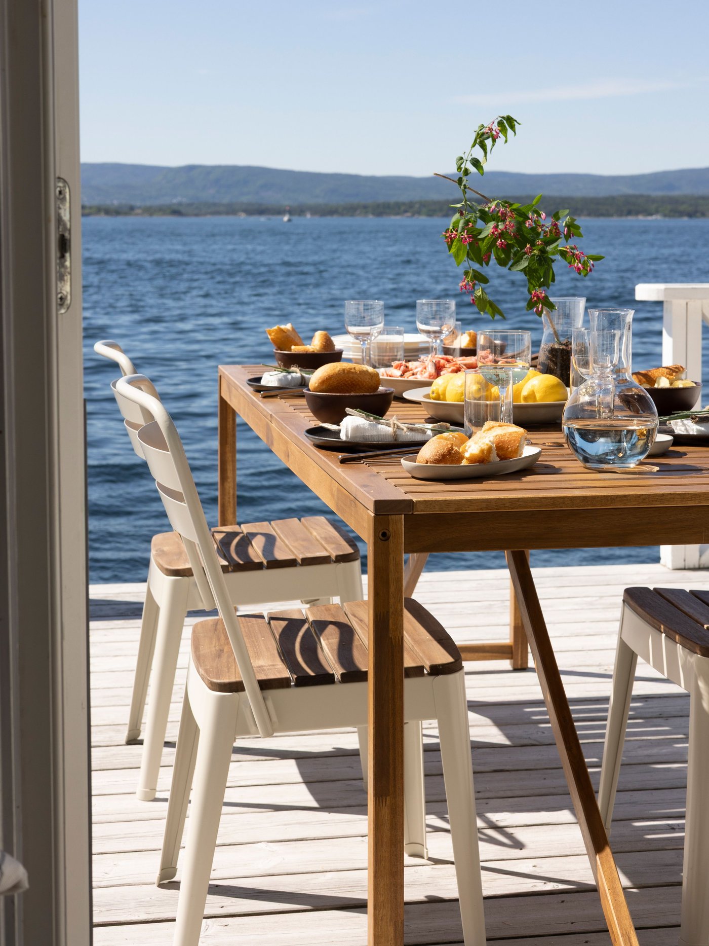 An in/outdoor beige/acacia NORRMANSÖ chair, outdoor