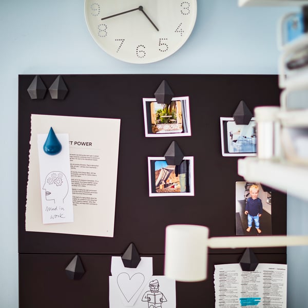 A black SVENSÅS memo board in the home office