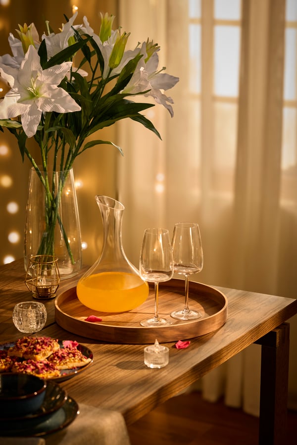 A clear glass STORSINT carafe